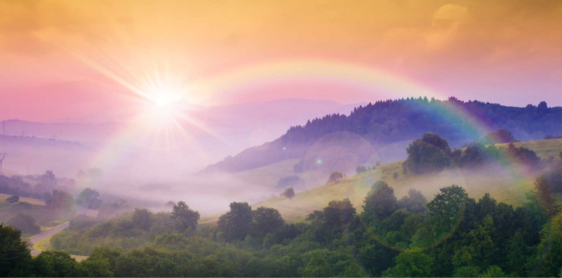 A rainbow and mountains